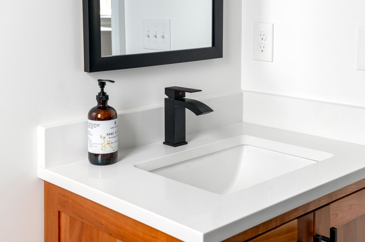 Matte black bathroom faucet and fixtures