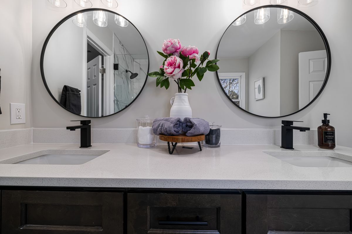 A bathroom that blends vintage character with clean modern fixtures